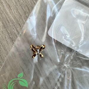 Kendra Scott 14k gold and diamond bow earring; single stud